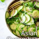 Pin Image: A bowl of asian cucumber salad with red onions with text overlaid