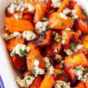 pin image: Roasted buffalo carrots topped with blue cheese with text overlaid
