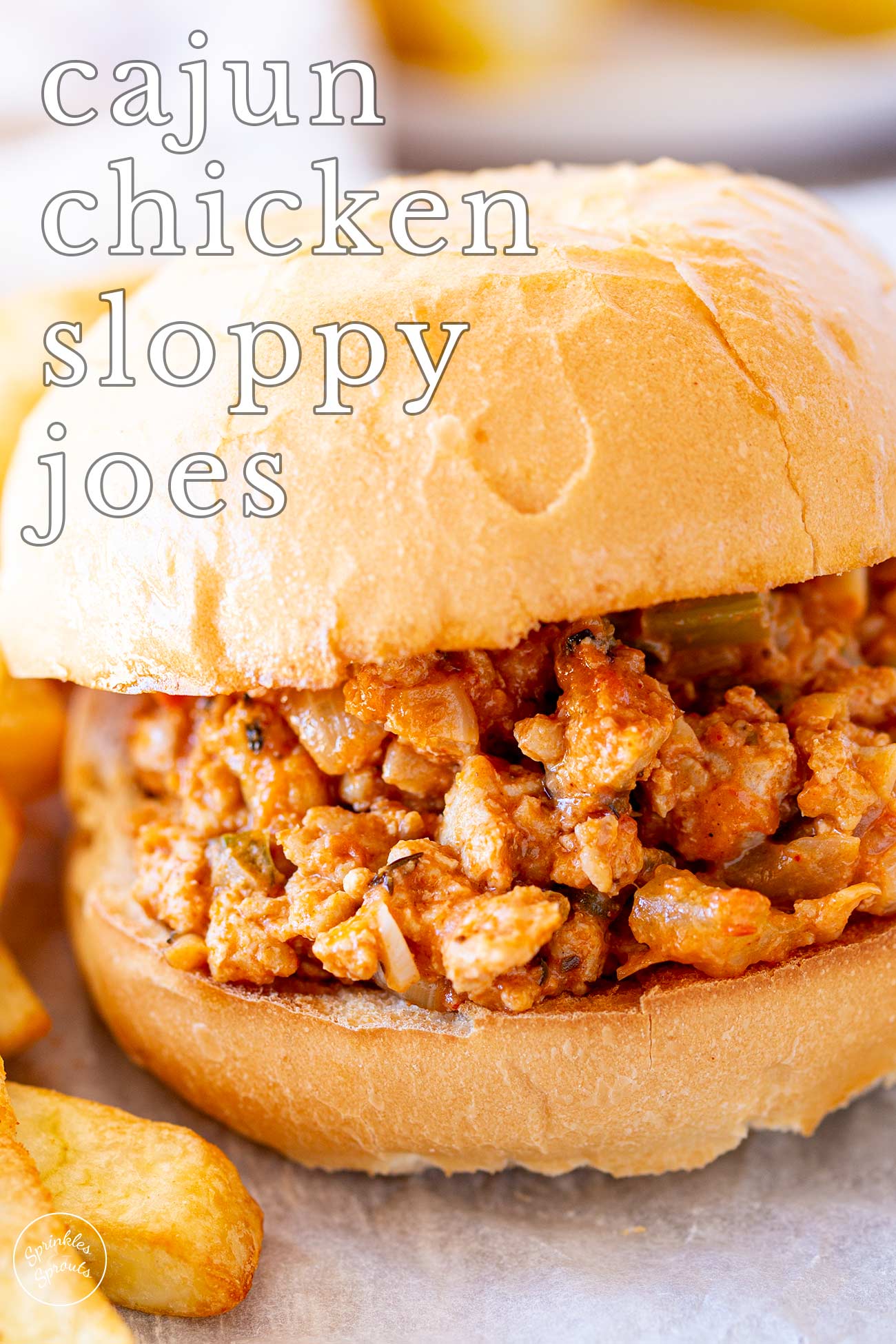Pin Image: Cajun chicken sloppy Joe sandwich with text overlaid