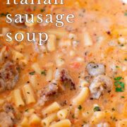 Pin Image: Creamy sausage soup in a pan with text overlaid