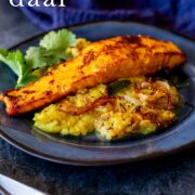 Pin Image: Salmon daal on a blue plate with text overlaid