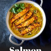 Pin Image: Salmon daal in a white cast iron skillet with text overlaid