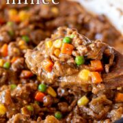 pin image: savoury mince in a skillet with a wooden spoon and text overlaid