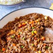 pin image: savoury mince in a skillet with a wooden spoon and text overlaid