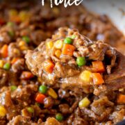 pin image: savoury mince in a skillet with a wooden spoon and text overlaid