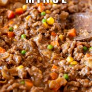 pin image: savoury mince in a skillet with a wooden spoon and text overlaid