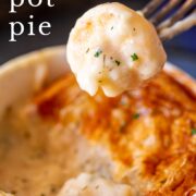 pin image: Fork with seafood pot pie filling with text overlaid