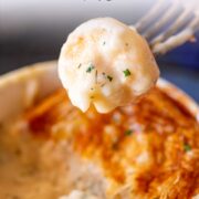 pin image: Fork with seafood pot pie filling with text overlaid