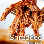 Pin Image: Shredded BBQ beef on a fork. With text overlaid