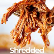 Pin Image: Shredded BBQ beef on a fork. With text overlaid