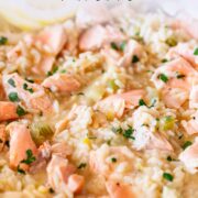 pin image: Sicilian salmon risotto with lemon slices with text overlaid