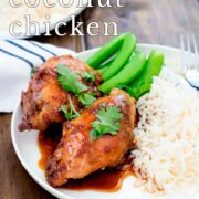 Pin Image: Sticky Coconut Chicken on a plate with rice and text overlaid