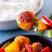 Pin Image: Sweet and Sour Chicken Meatballs on a fork with text overlaid