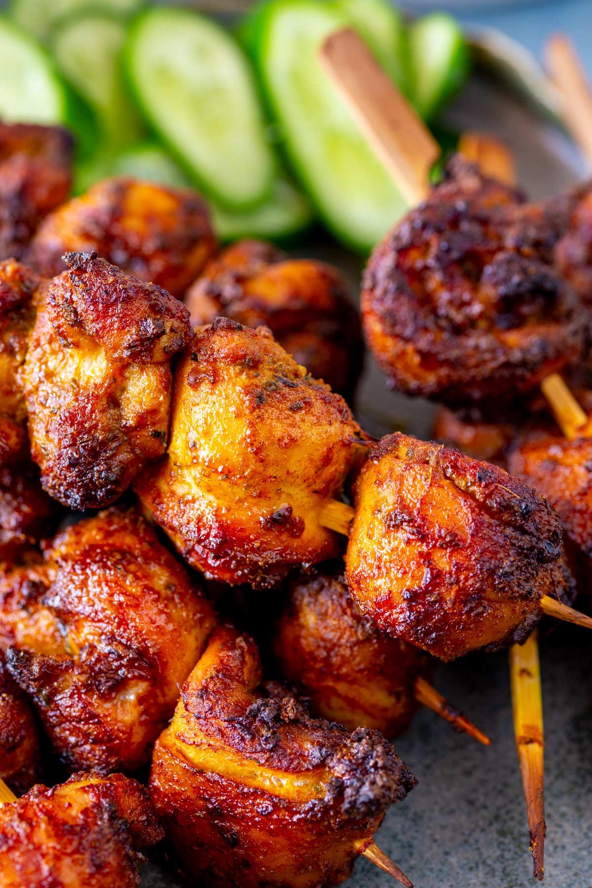 A close-up view of air fryer chicken shawarma skewers, showing the crispy, spiced exterior.