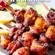 pin image: air fryer chicken shawarma skewers on a rustic blue grey plate with text overlaid