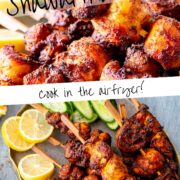 pin image: air fryer chicken shawarma skewers on a rustic blue grey plate with text overlaid