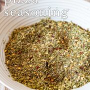 Pin Image: Pizza seasoning in a cream bowl with text overlaid