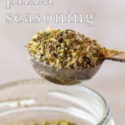 Pin Image: Pizza seasoning on a measuring spoon with text overlaid