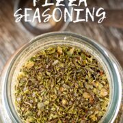Pin Image: Pizza seasoning in a glass jar with text overlaid
