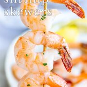 Pin Image: Shrimp skewer held upright with text overlaid