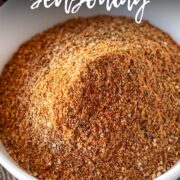 pin image: Moroccan seasoning in a white bowl with text overlaid