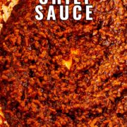 Pin Image: Chili sauce in red skillet with text overlaid top and bottom