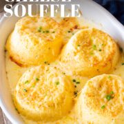Pin Image: Four cheese soufflés in rustic white baking dish with text overlaid