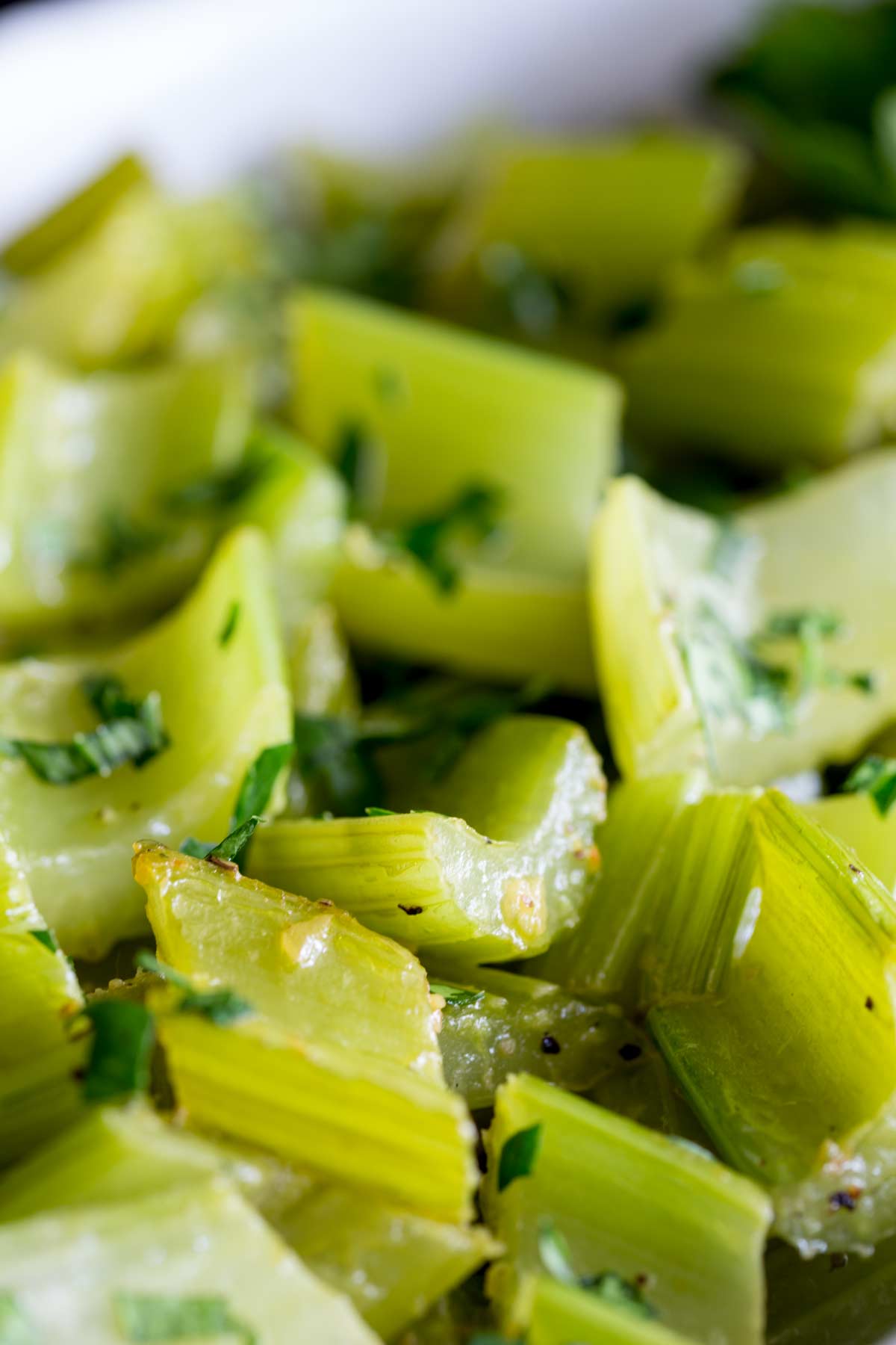 Close up on the cooked celery showing the slight colour and the change in texture.