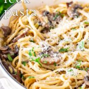 Pin Image: Mushroom and leek pasta in a cream cast iron pan with text overlaid