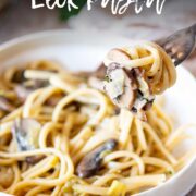 Pin Image: Small cream bowl of spaghetti with fork ready to eat with text overlaid