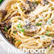 Pin Image: Mushroom and leek pasta in a cream cast iron pan with text overlaid