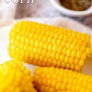Pin Image: Corn on the cob cooked in the microwave with text overlaid