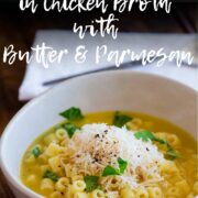 Pin Image: Ditalini pasta with broth in a white bowl with text overlaid