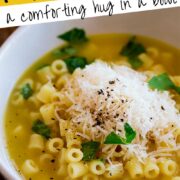 Pin Image: Ditalini pasta with broth in a white bowl with text overlaid