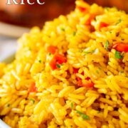 Pin Image: Portuguese rice in a blue bowl with text overlaid