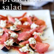 Pin Image: Fig, ricotta, and prosciutto salad on a white plate with text overlaid