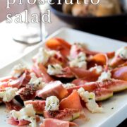 Pin Image: Fig, ricotta, and prosciutto salad on a white plate with text overlaid