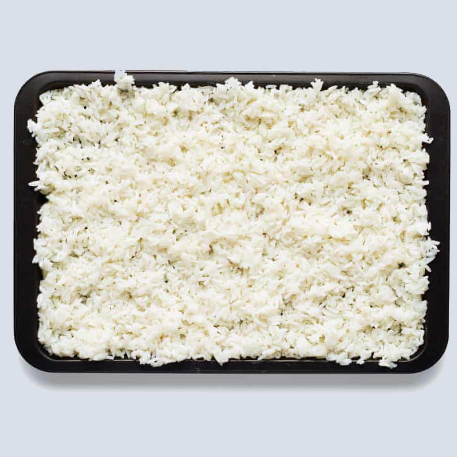 cold rice on a baking sheet