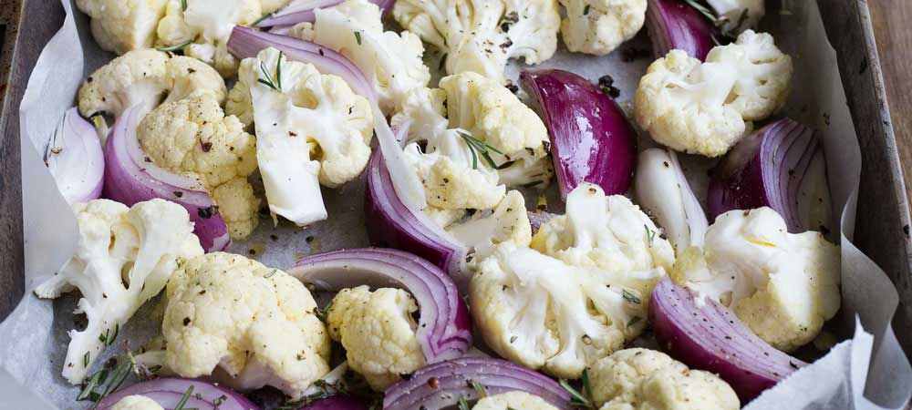 Roasted Rosemary Cauliflower. A simple, delicious and versatile side dish. This roasted cauliflower is perfect with a roast or with a pan fried steak.