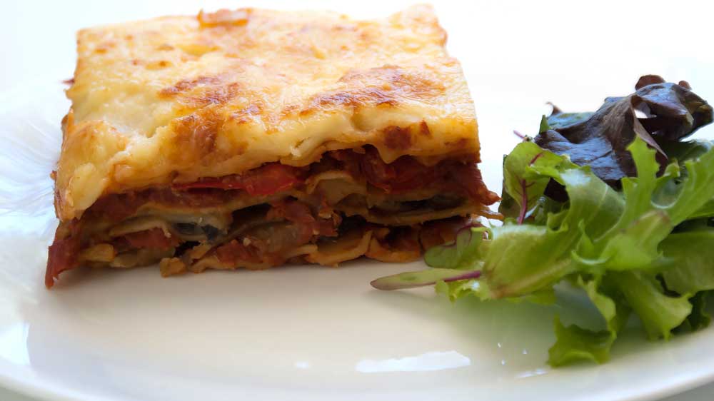 Chargrilled Vegetable Lasagne. A delicious vegetarian lasagne recipe, packed full of roasted capsicums, zucchinis and mushrooms. This dish can be prepared ahead of time making it ideal for casual entertaining.