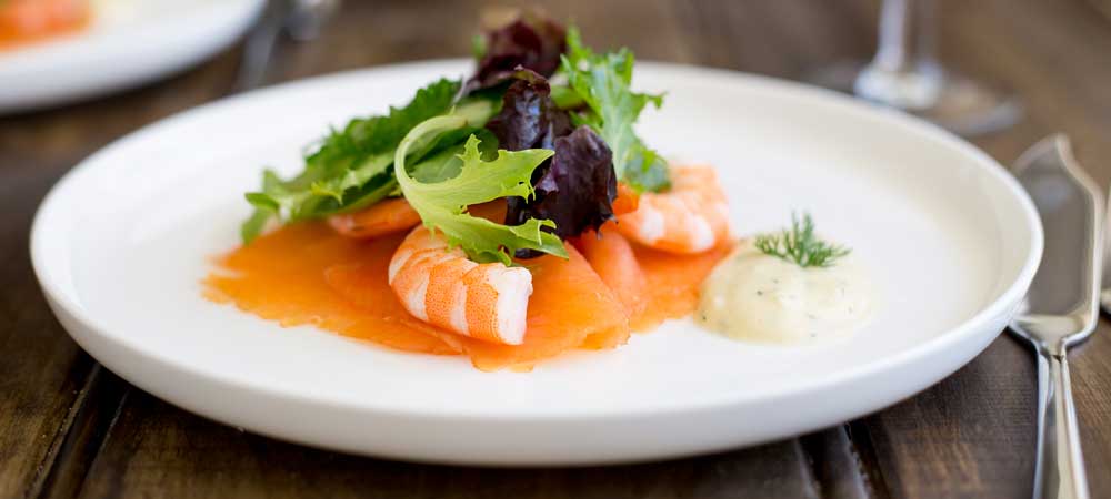 This Salmon and Prawn Salad with a Gravlax dressing is perfect for Christmas. It is rich yet light, feels posh and is super simple to make. As part of a Christmas feast it is the perfect first course. | Sprinkles and Sprouts