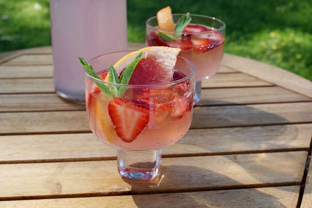 Pink Grapefruit and Strawberry Punch. Great summer drink with alcoholic and non alcoholic options.