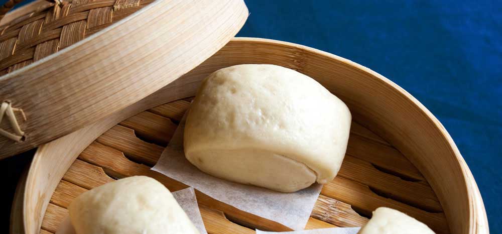 Mantou - Steamed Buns. These steamed soft and fluffy buns are perfect with noodle soups or any Chinese dish.